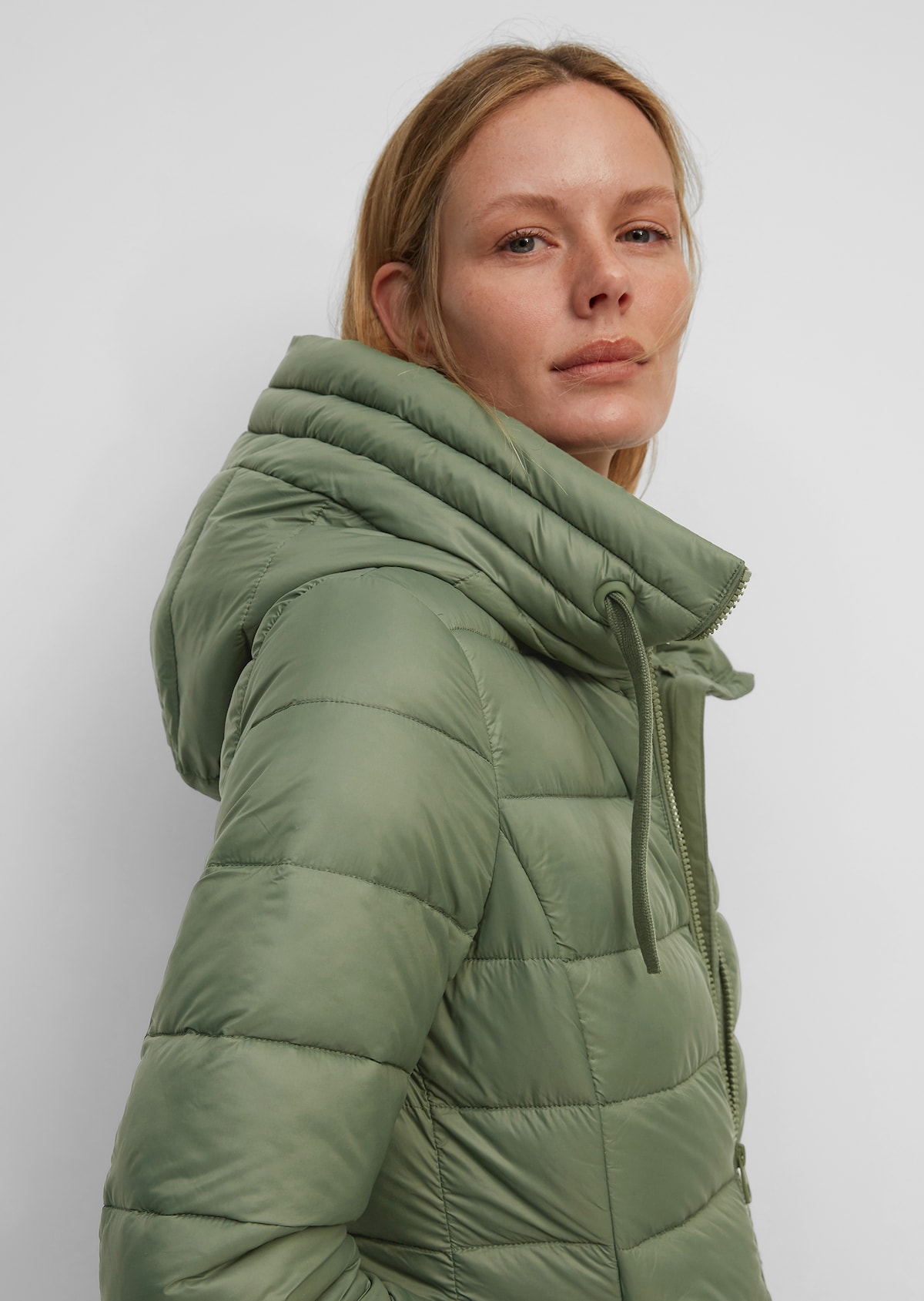 Tochi tree speaker Breathing Hooded quilted coat made of recycled materials - green | Coats | MARC O'POLO