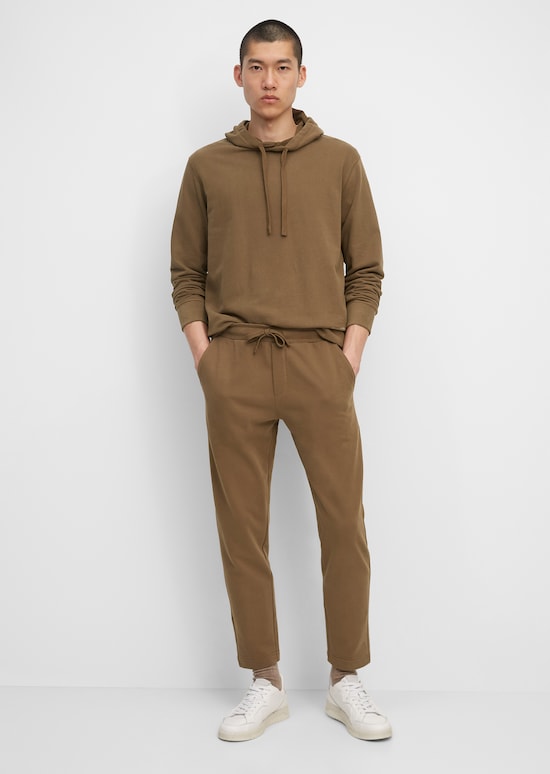 Tracksuit bottoms made of peached organic cotton - brown | Sweat ...