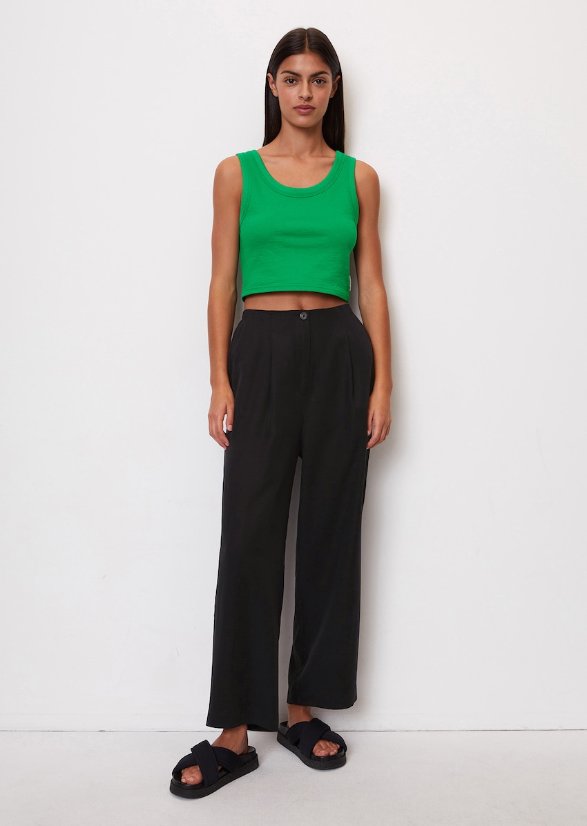 Casual summer trousers with waist pleats made from a blend of lyocell and  linen