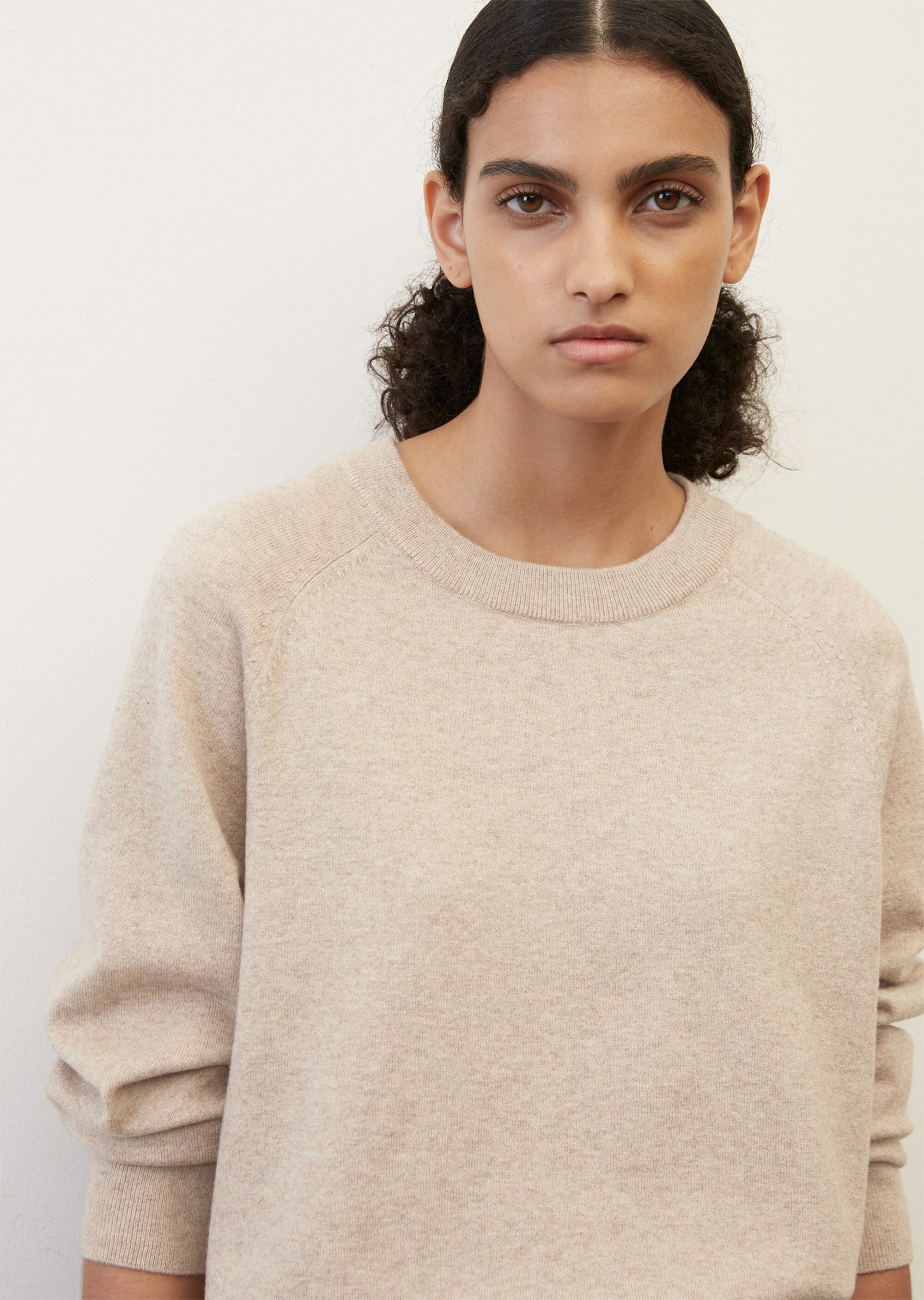 Basic round neck knitted jumper made from a soft virgin wool mix